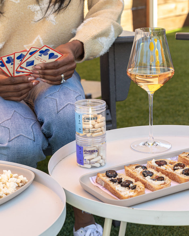Snapshot of a party with cheers products on a table 