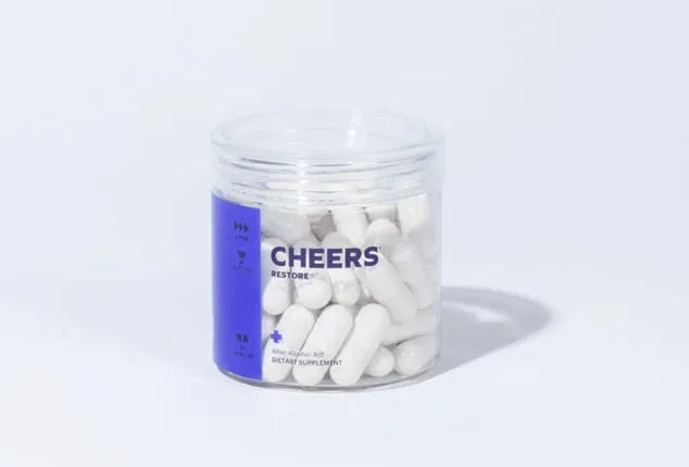 Jar of white capsules with 'Cheers' label on a light gray background
